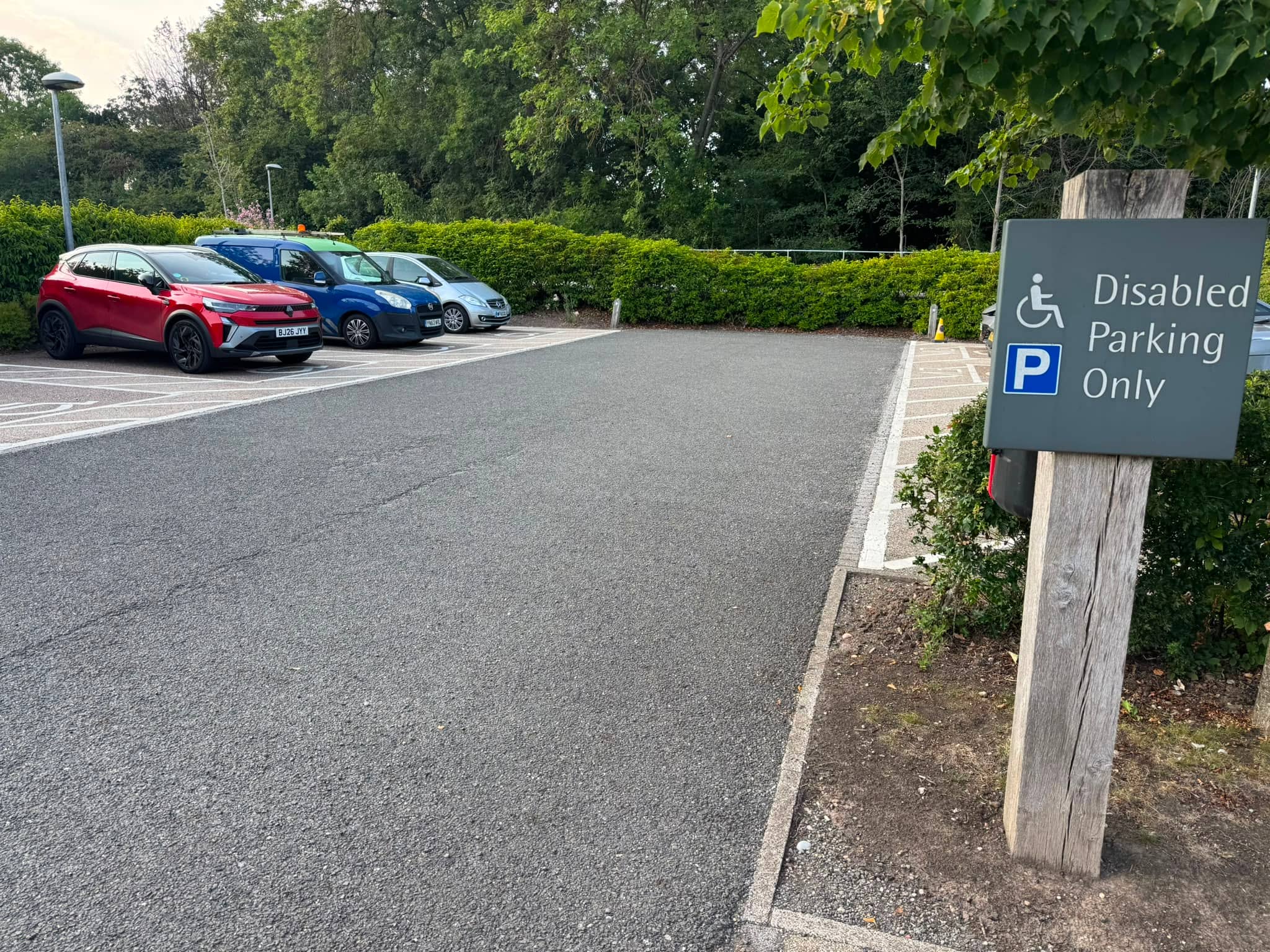 Clearly signed accessible parking spaces at Marie Curie Hospice